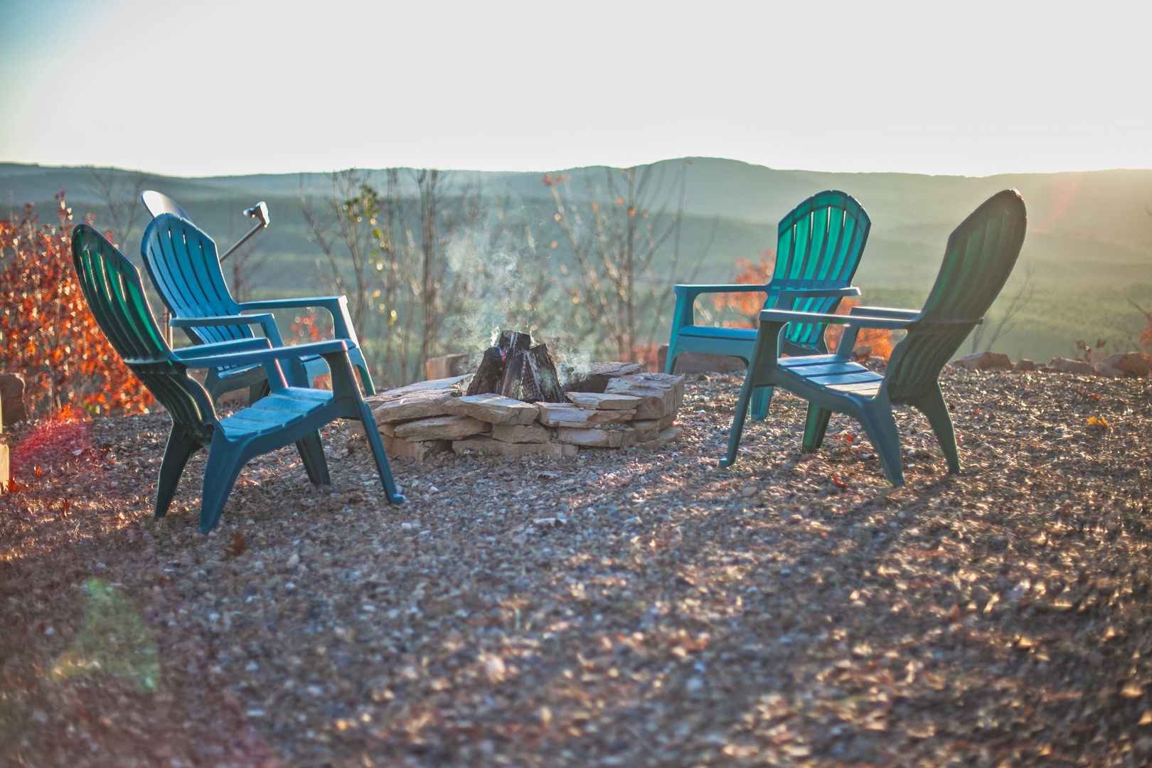 Gather around the stone fire pit as golden hour light dances across the mountains, creating perfect moments for stargazing and storytelling.