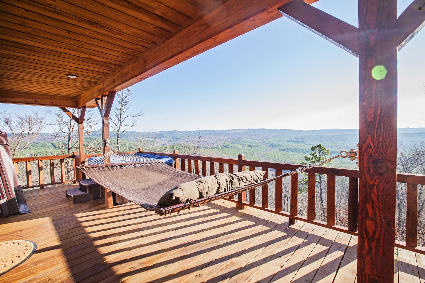Sway gently in your private hammock while soaking in breathtaking mountain vistas from this peaceful covered deck.