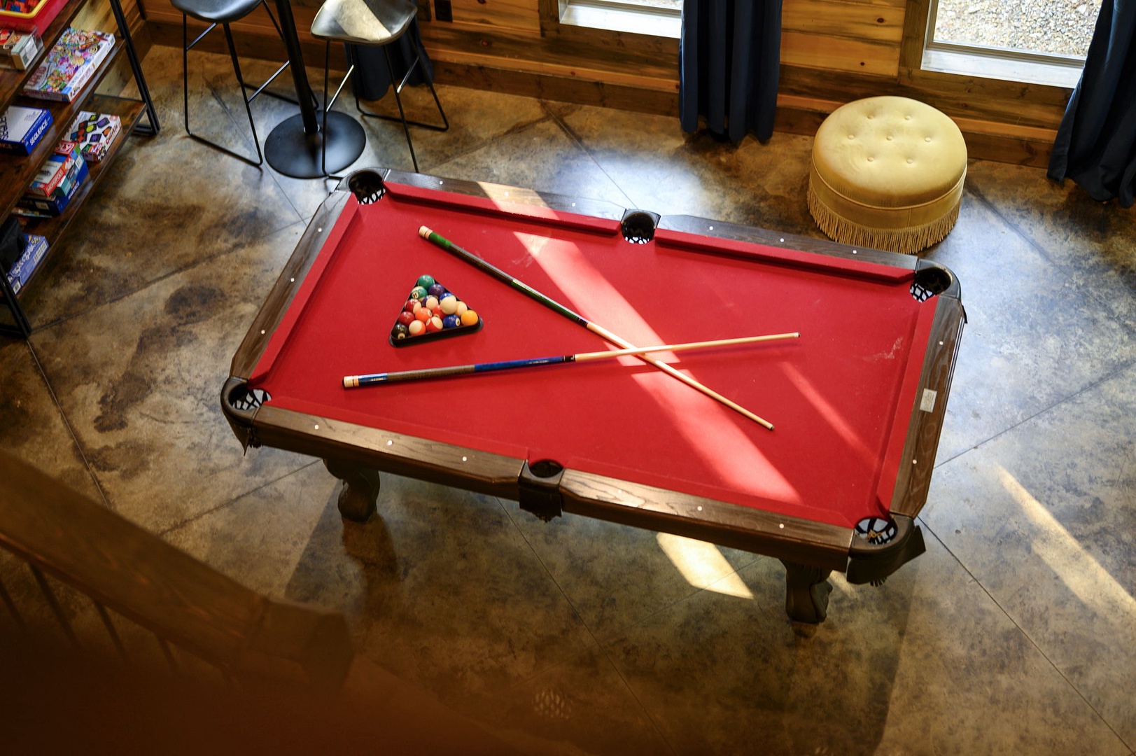 Challenge a friend to a game on your private billiards table, perfectly set and ready for playful competition in the comfort of your rental.