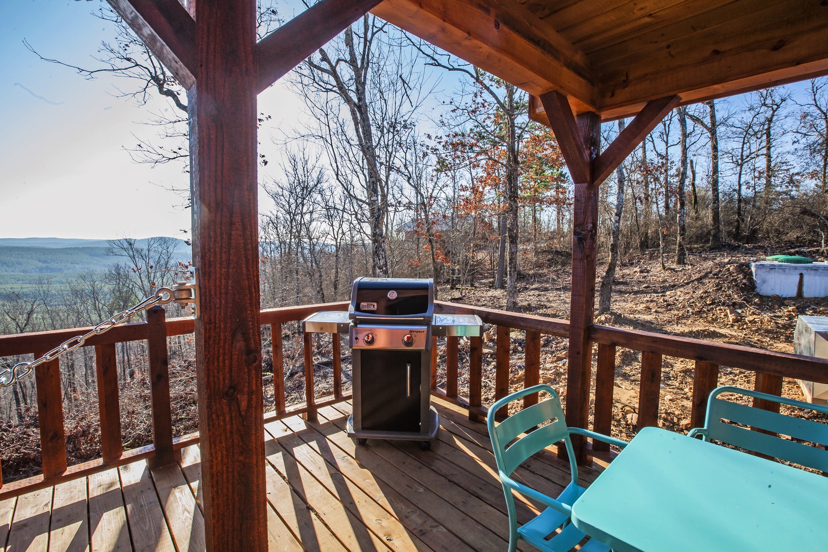 Fire up the grill on your private deck while taking in sweeping forest views that stretch to distant mountains.