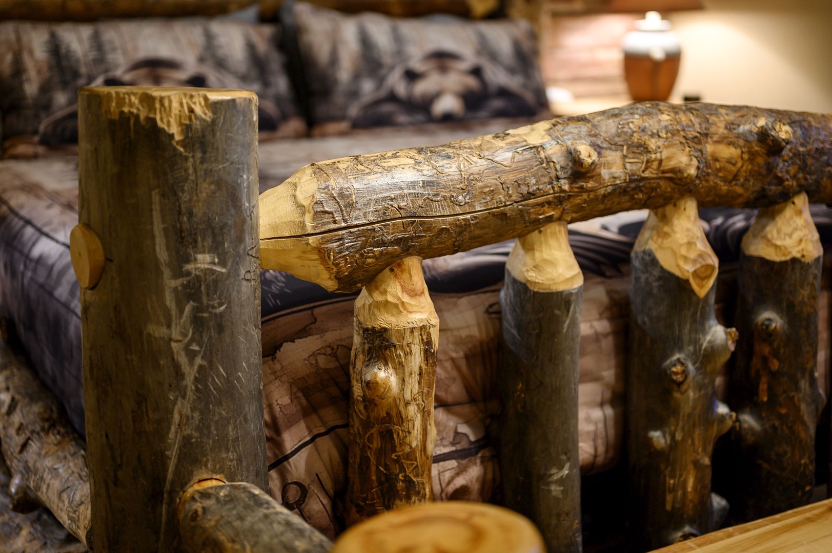 Unwind by the handcrafted log furniture where rustic charm meets your comfort in this inviting mountain retreat.