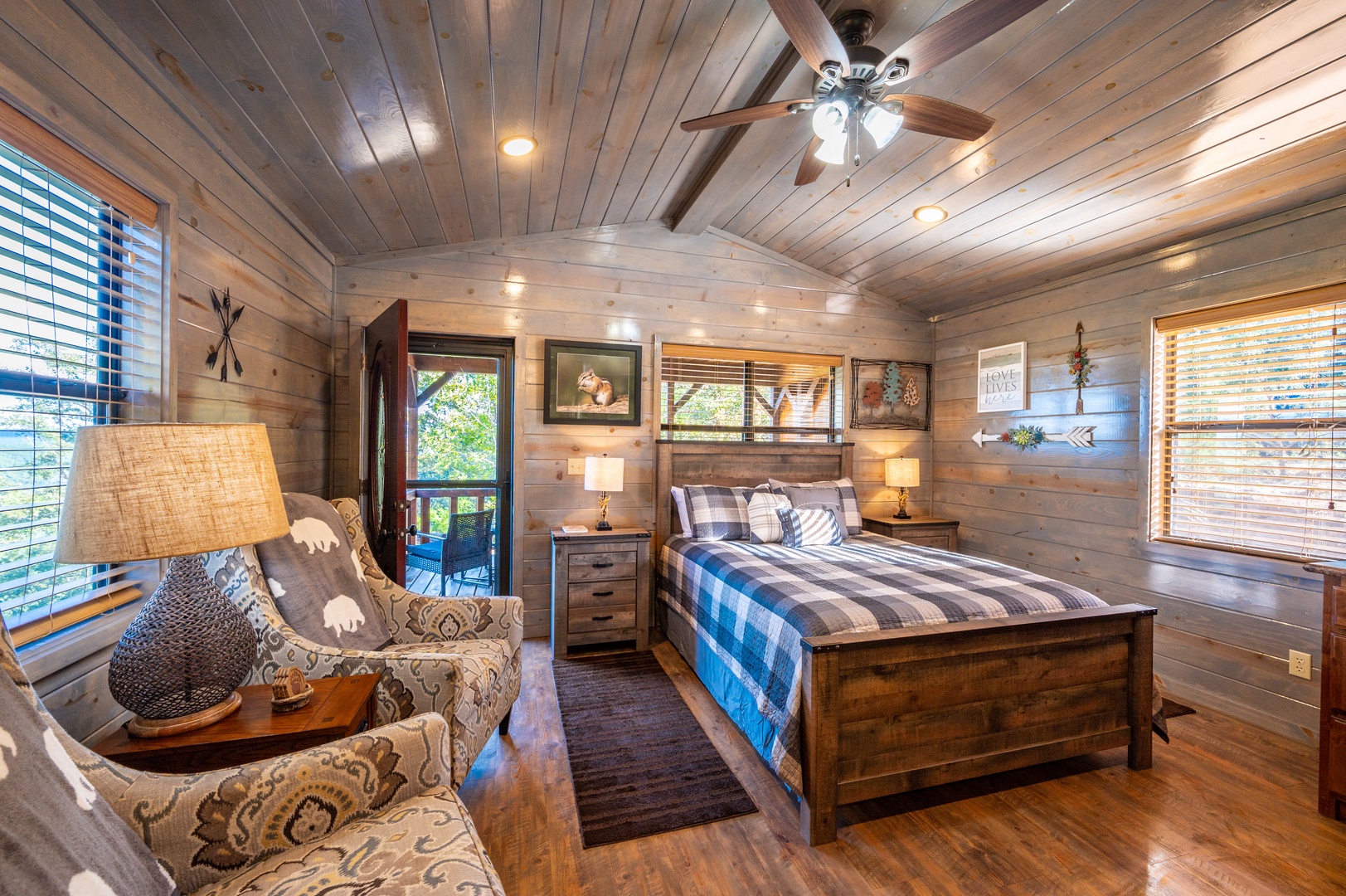 Drift off to peaceful sleep in your cozy log cabin bedroom, complete with rustic charm and modern comfort.