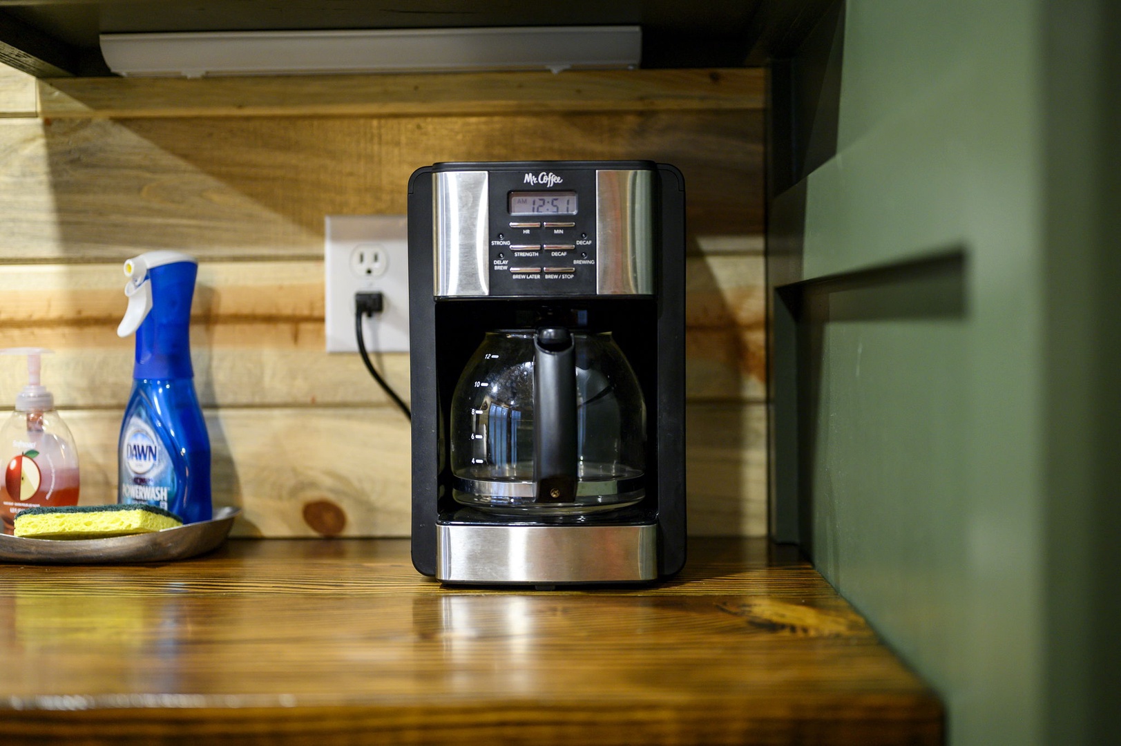 Start your mornings right with fresh coffee from your own programmable Mr. Coffee maker, perfectly positioned on beautiful wood countertops.
