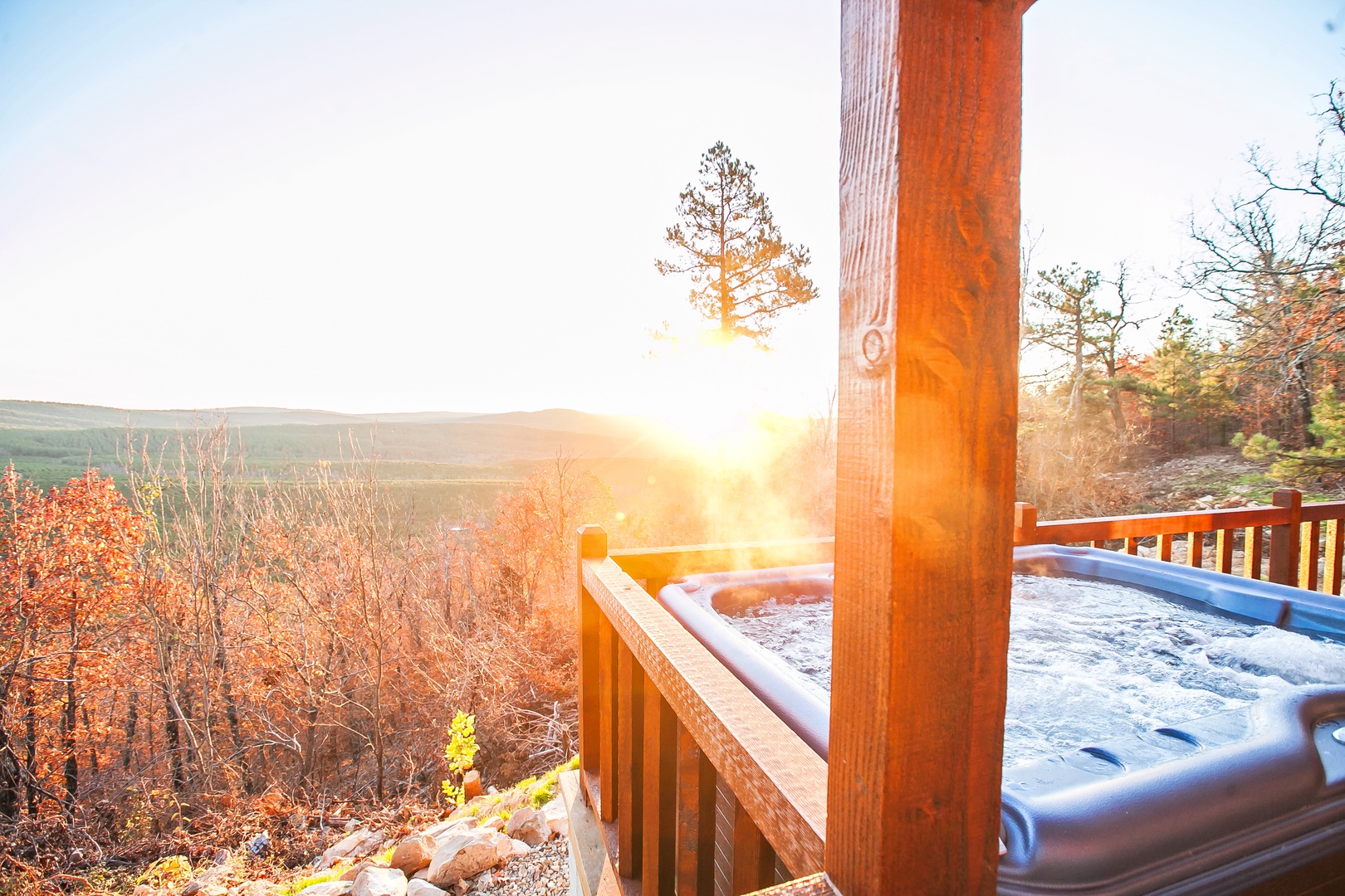 Soak in your private hot tub as golden sunlight bathes the landscape, creating perfect moments for relaxation and connection.