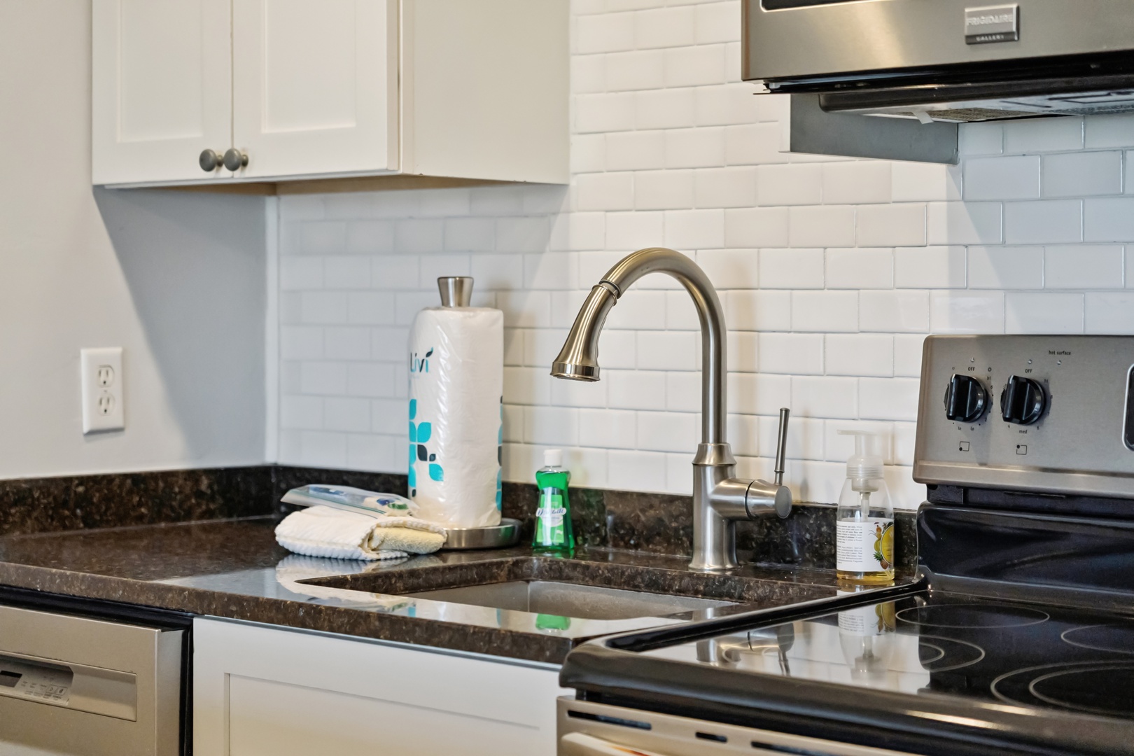 Your fully equipped kitchen features granite countertops and modern appliances, perfect for preparing meals during your stay.