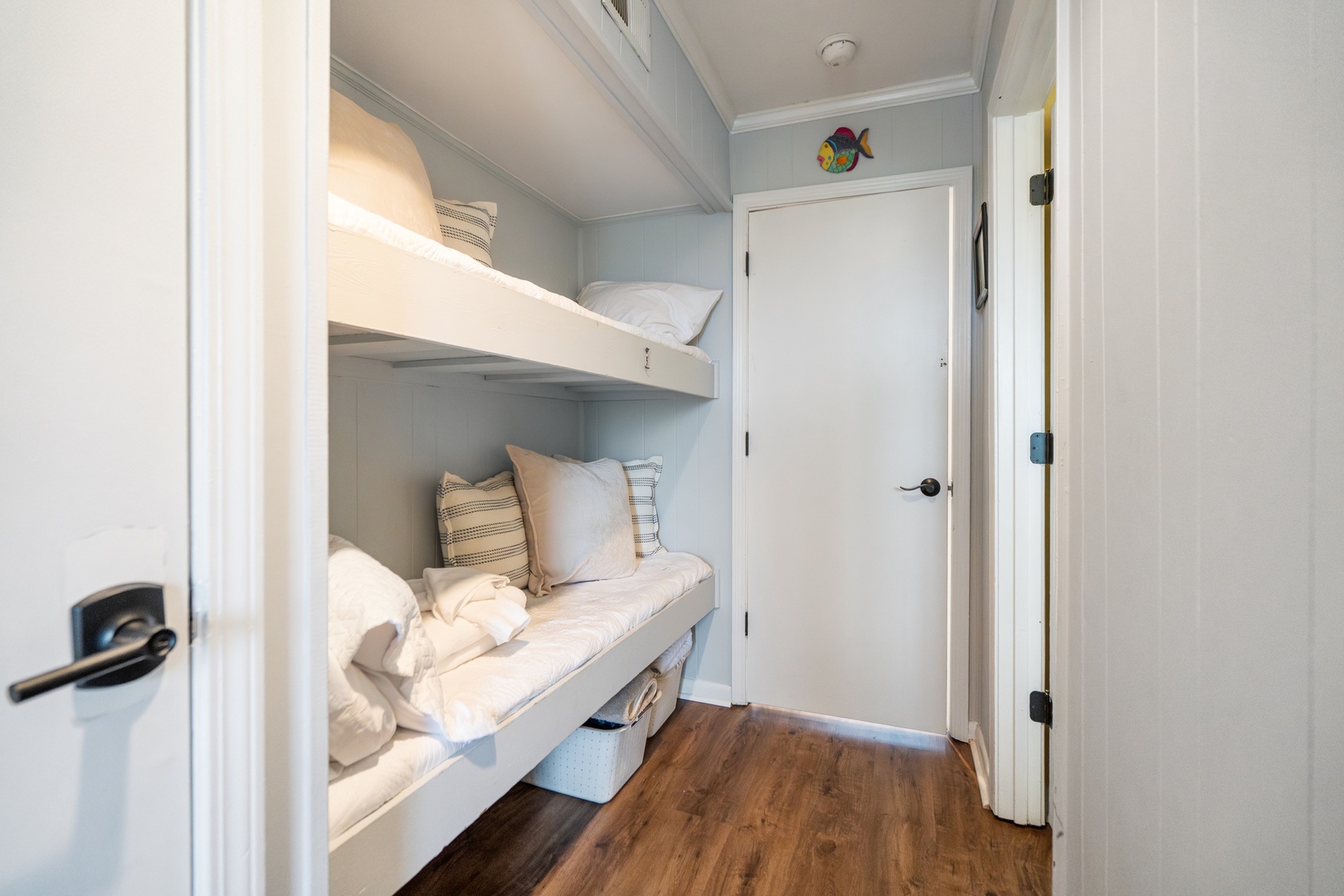 Cozy bunk beds create the perfect sleepover spot, with soft linens and thoughtful storage making bedtime feel like an adventure.