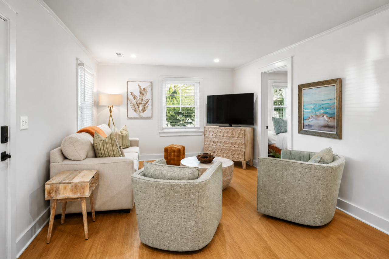 Sink into plush seating and natural light in your peaceful living room, where thoughtful coastal touches create the perfect retreat.