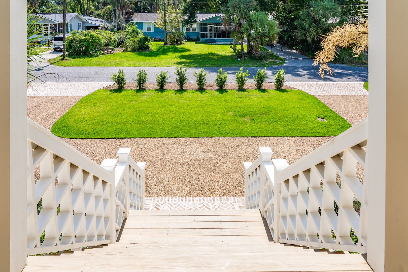 The property features a welcoming exterior with a well-maintained lawn and mature landscaping, located in a peaceful residential neighborhood.