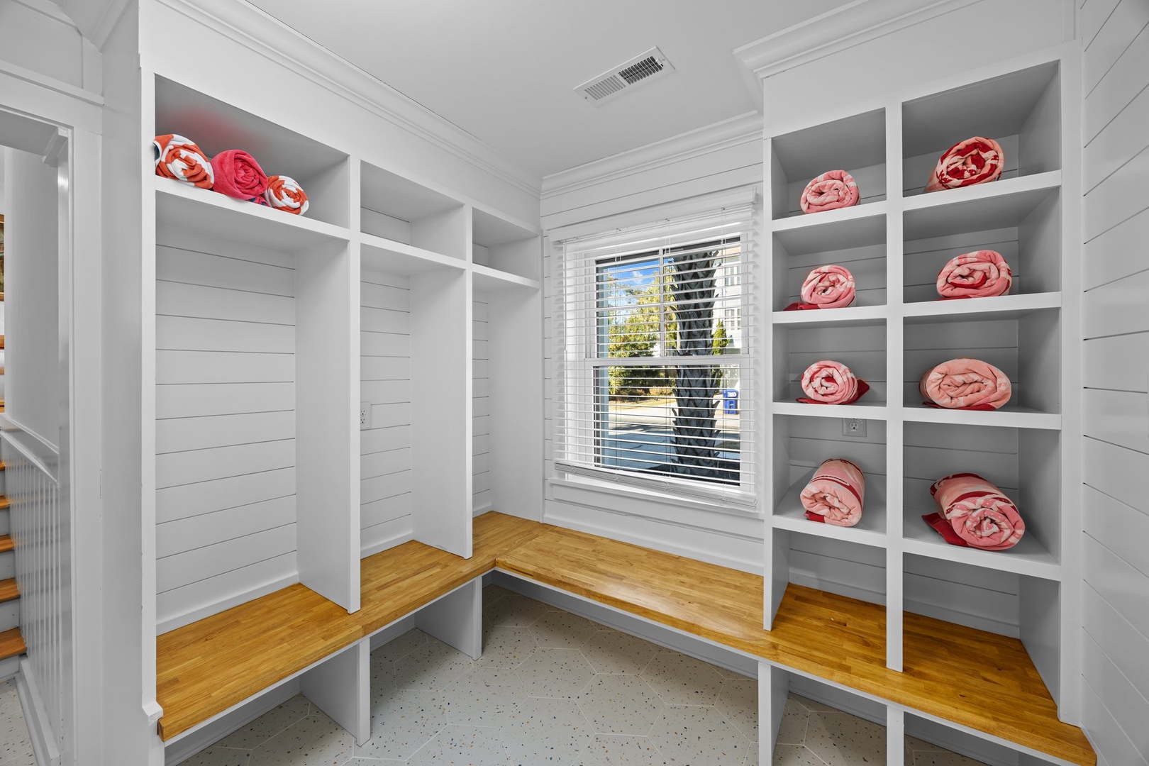 Your private spa closet awaits with plush towels and built-in storage for all your vacation essentials.