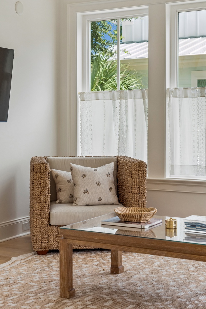 Sink into this cozy textured armchair and let the sunlight warm your space, perfect for morning coffee or unwinding with a good book.