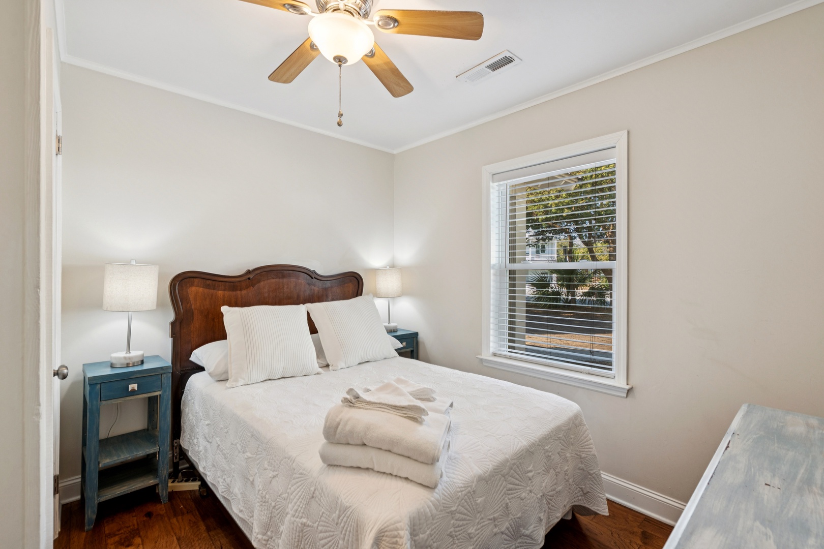 Drift off to sleep in your cozy bedroom with plush linens and thoughtful touches for ultimate comfort.