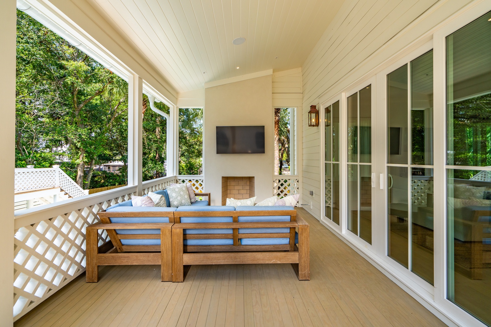 Unwind on your private covered porch with garden views and a cozy fireplace—perfect for morning coffee or evening relaxation.