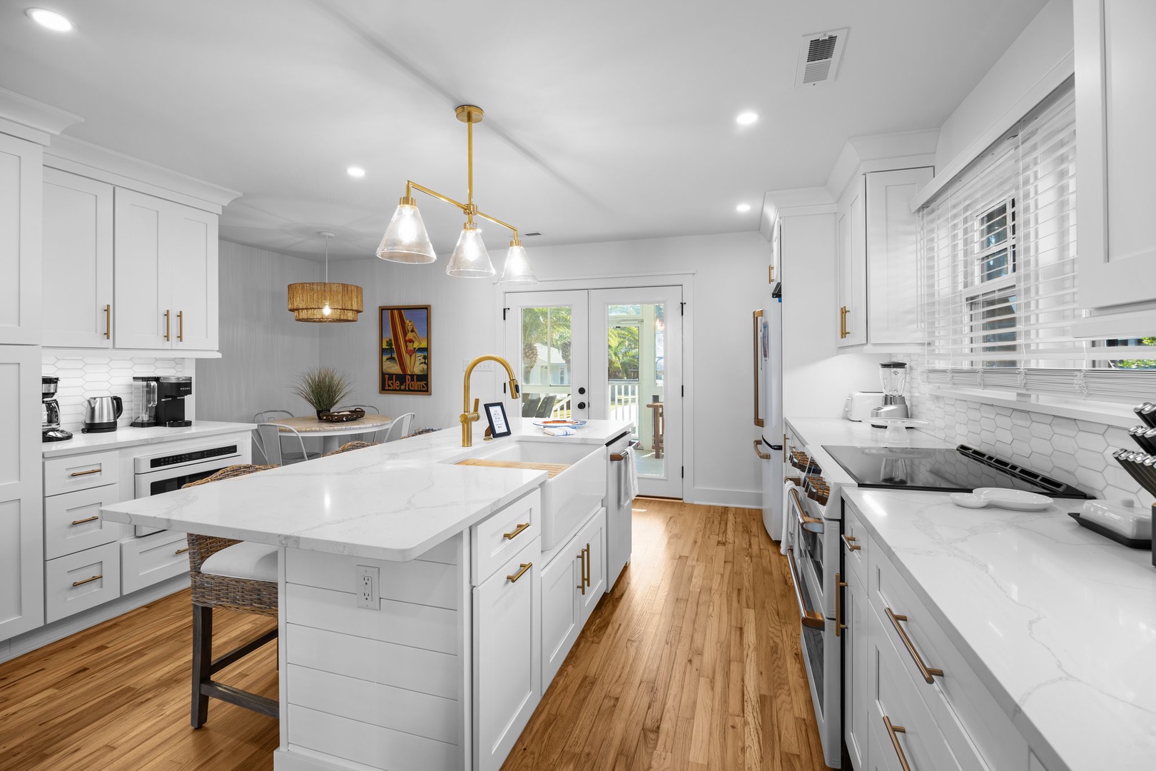 Your gourmet kitchen awaits with marble countertops, gold fixtures, and everything you need to create memorable meals together.