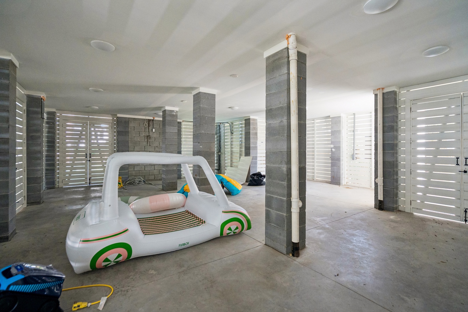 Kick back in your private covered poolside cabana, complete with playful inflatables and loungers for ultimate relaxation under the shade.