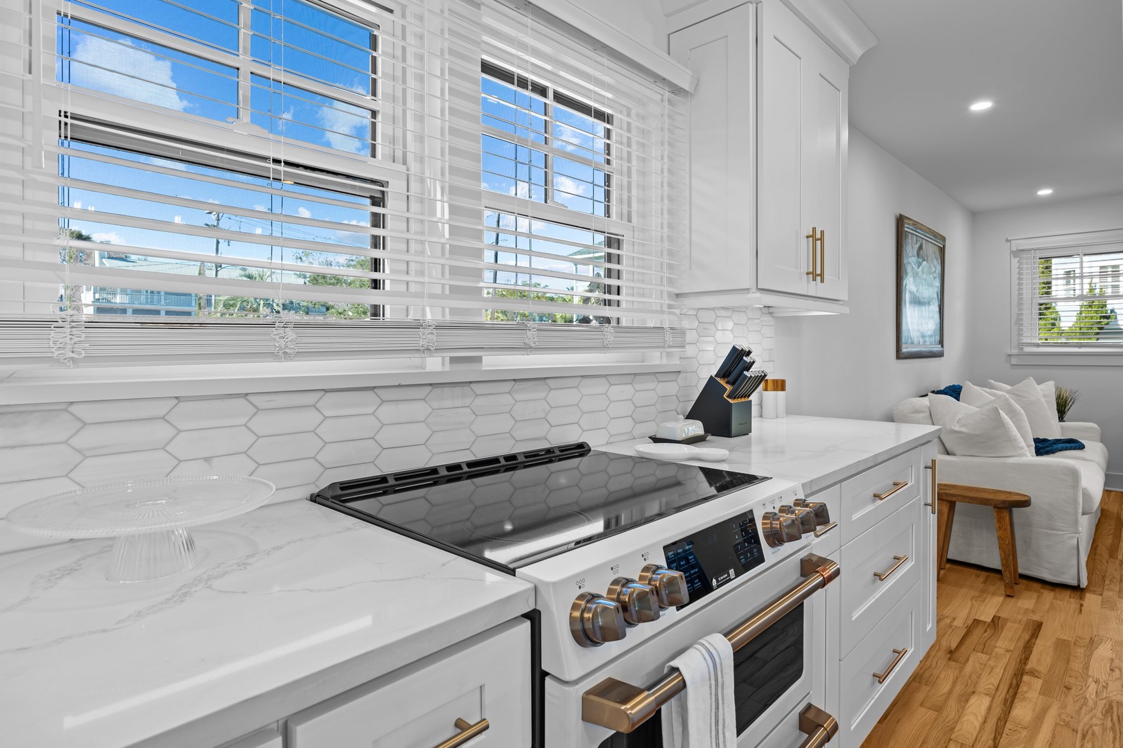 Whip up your favorite meals in this bright, modern kitchen with premium appliances and a cozy breakfast nook.