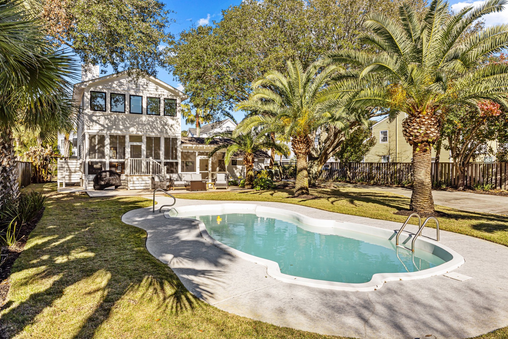 Tropical paradise awaits with your private pool surrounded by swaying palms and sunshine.