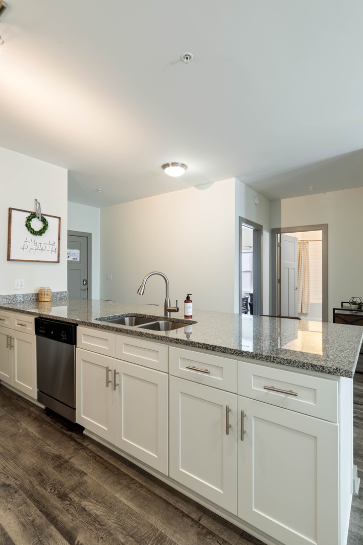Designed with connection in mind, the kitchen offers a welcoming space to cook, chat, and make memories together.
