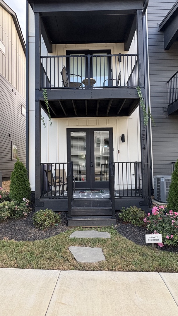 Relax on the porch with convenient access to nearby sidewalks.