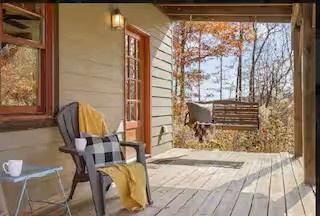 Start your morning with a cup of coffee or wind down in the evening on the spacious covered porch. With plenty of comfortable seating, it's the perfect spot to relax, reconnect, and enjoy the peaceful surroundings.