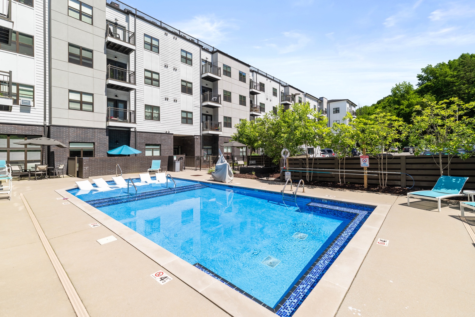 Relax and unwind in the beautifully maintained shared pool, perfect for cooling off and enjoying sunny days during your stay.