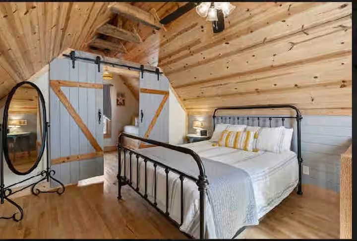 Rest easy in the cozy queen bedroom, thoughtfully designed with soft linens and a comfortable mattress to help you wake up refreshed and ready for your next adventure.