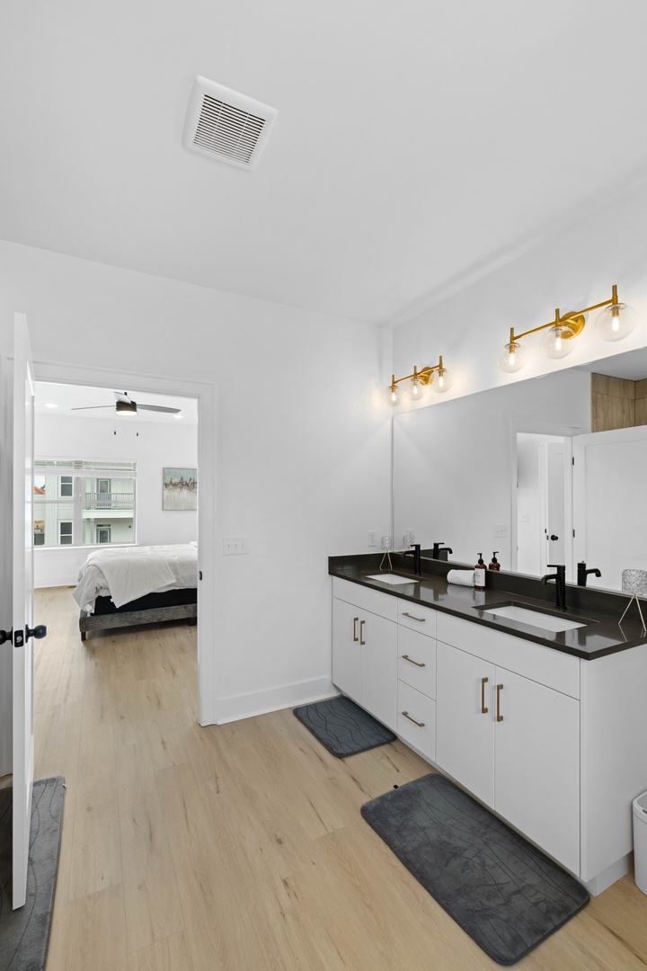 Enjoy the convenience of a private full bathroom attached directly to the bedroom
