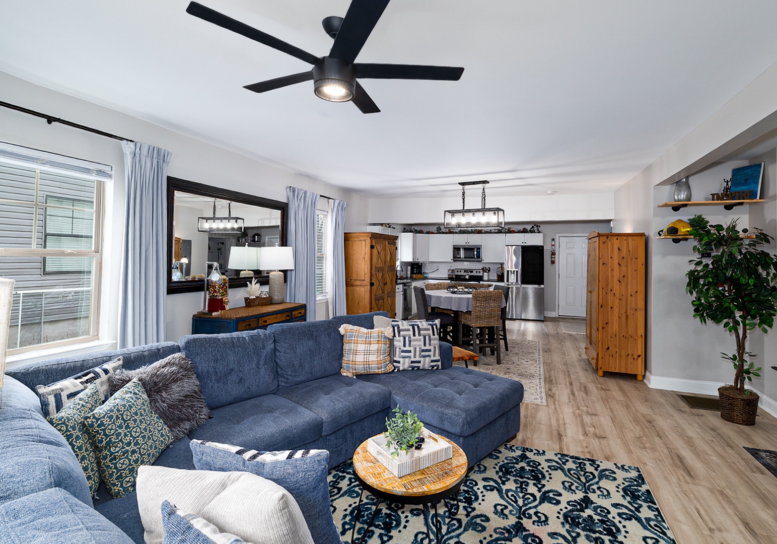 Shared living room with ceiling fan