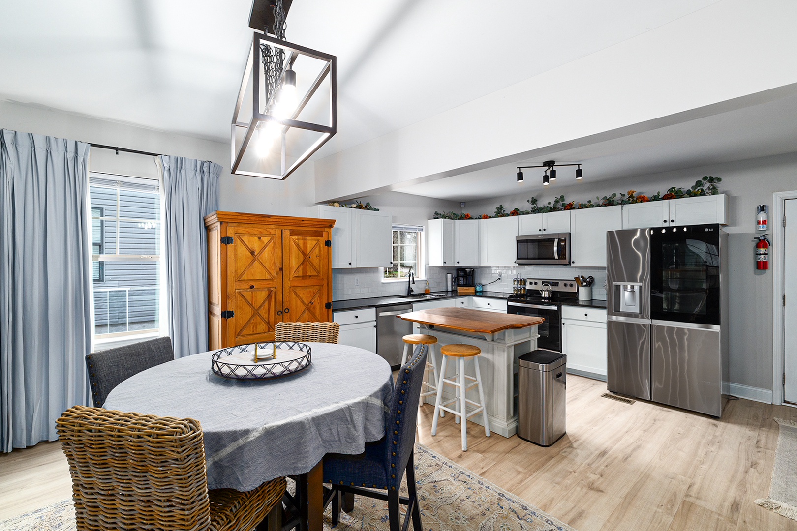 Shared dining room with extra cabinet space for guest storage