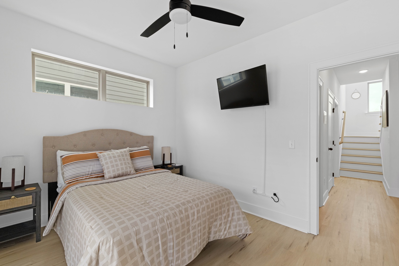 Unwind in bed with your favorite shows and movies on the bedroom TV.