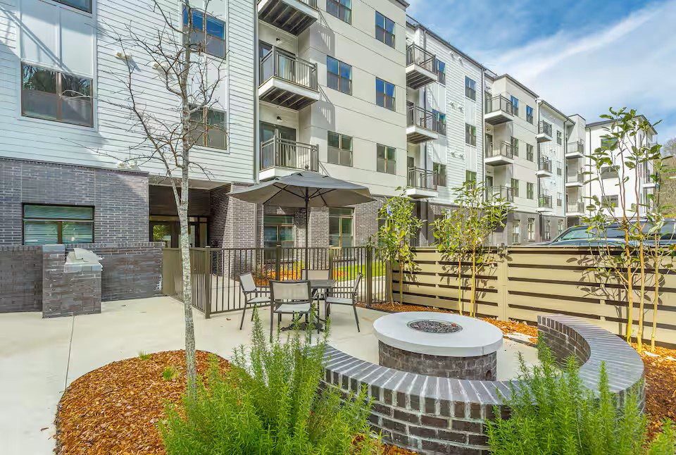 Enjoy the courtyard with fire pit seating area and outdoor grilling station.