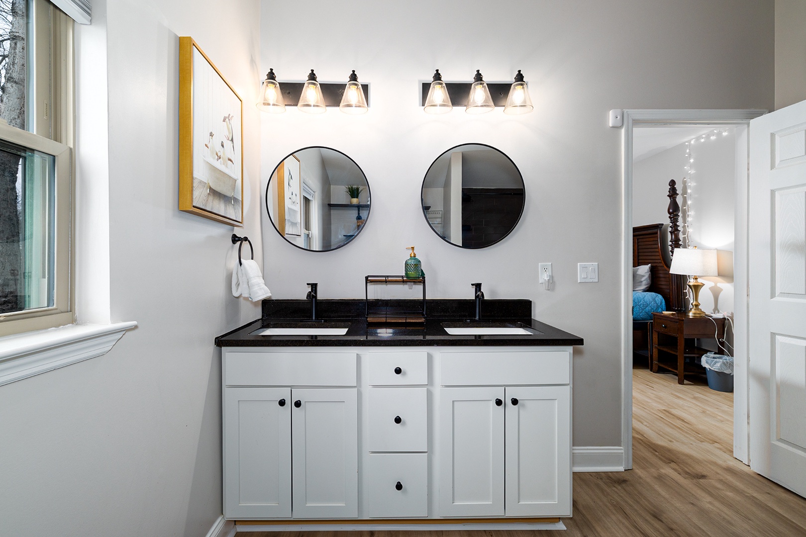 Private attached bathroom with double vanity