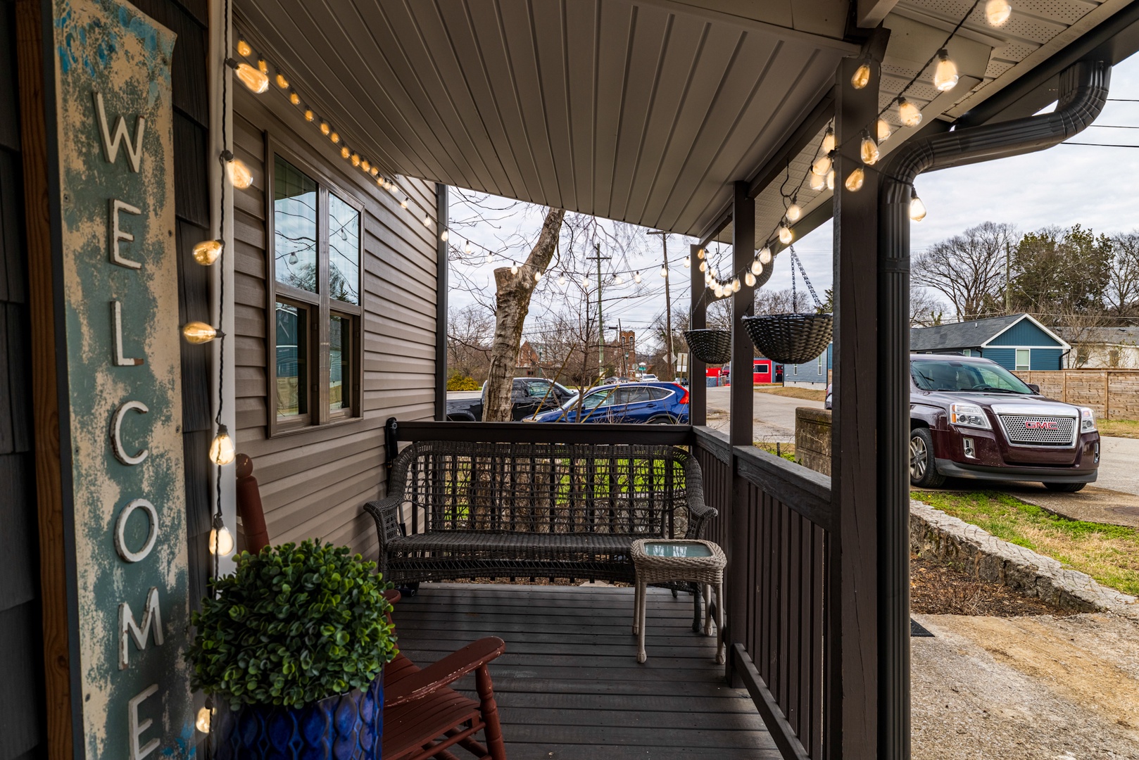 Front patio with seating and outdoor lighting