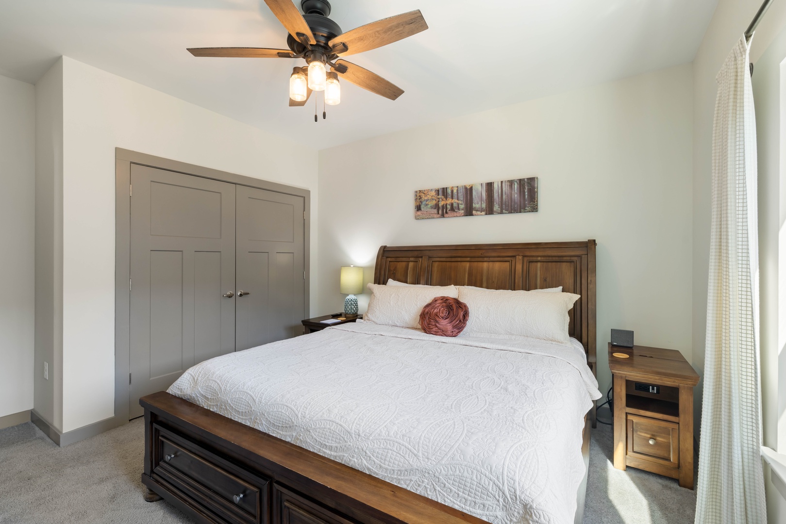 Relax in this inviting bedroom designed with comfort and a restful night’s sleep in mind.