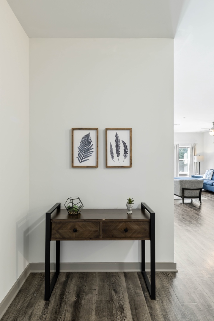 Step inside and feel right at home with a convenient entry table, perfect for setting down keys, bags, and everyday essentials as you come and go.