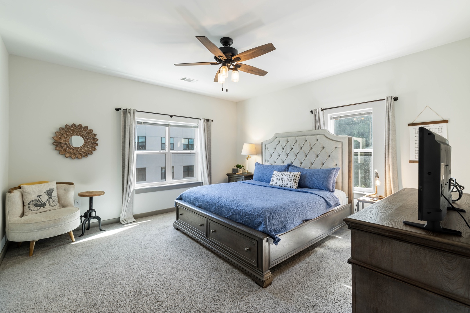 Enjoy a restful night’s sleep in the spacious king bed with soft linens and cozy bedding.