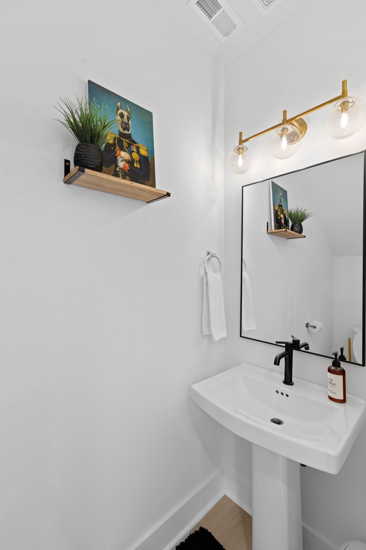 A convenient half bath is located on the main floor for easy access.