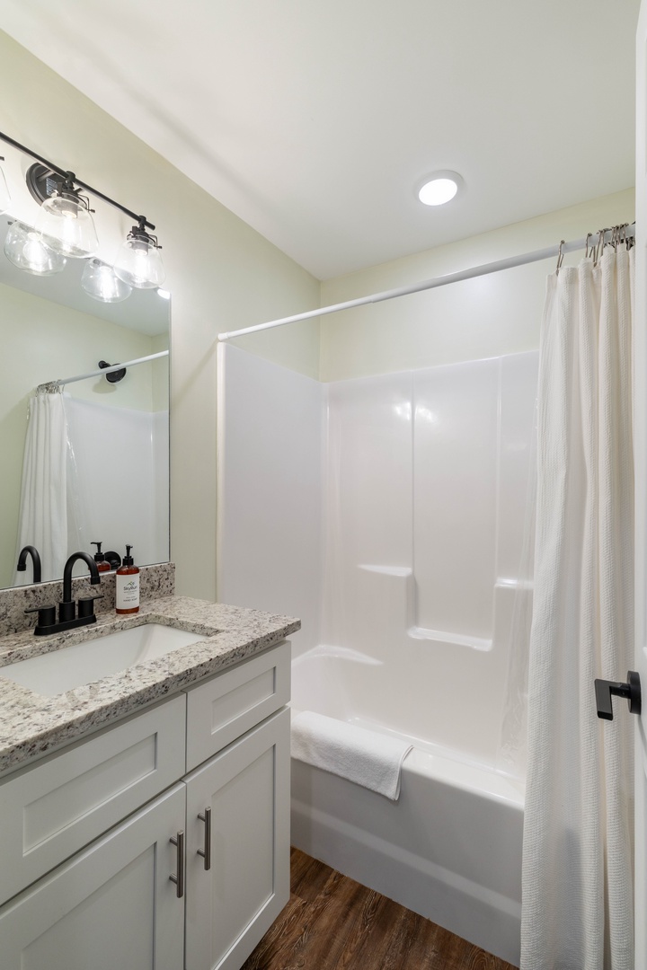 Second Bathroom Featuring Bath and Shower