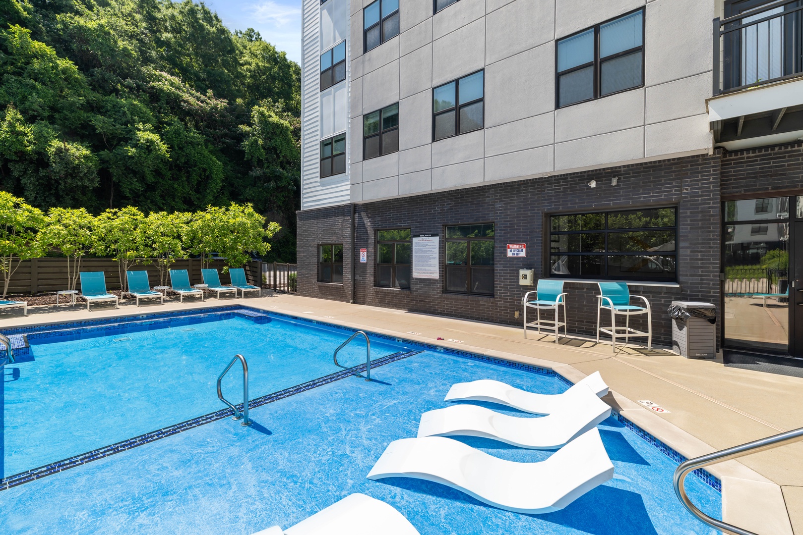 Enjoy a unique pool experience with in water lounge chairs designed for relaxing while staying cool and comfortable.