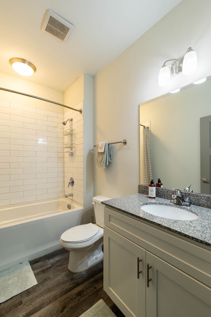 Enjoy the convenience of complimentary guest essentials and a tub/shower combination, providing everything you need to refresh and unwind during your stay.