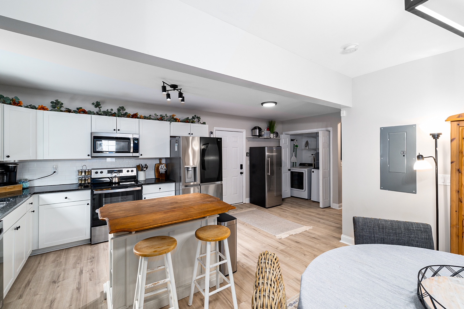 Kitchen with kitchen island and additional seating