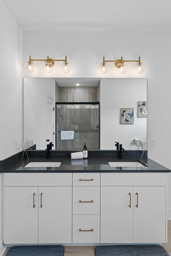 Enjoy the convenience of a spacious double sink vanity, perfect for getting ready with ease