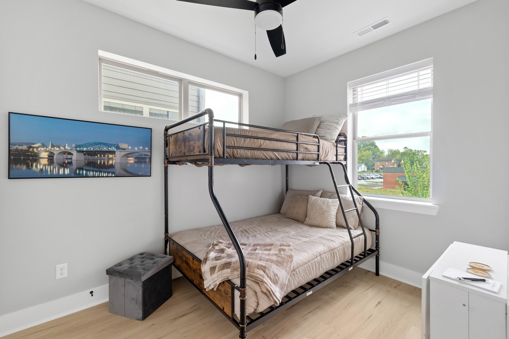A fun and comfortable twin over full bunk bed offers flexible sleeping space for kids or adults.