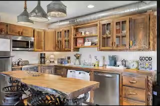The kitchen is stocked with modern appliances and essentials to make preparing meals simple and convenient throughout your stay, whether you're cooking a full dinner or a quick snack.
