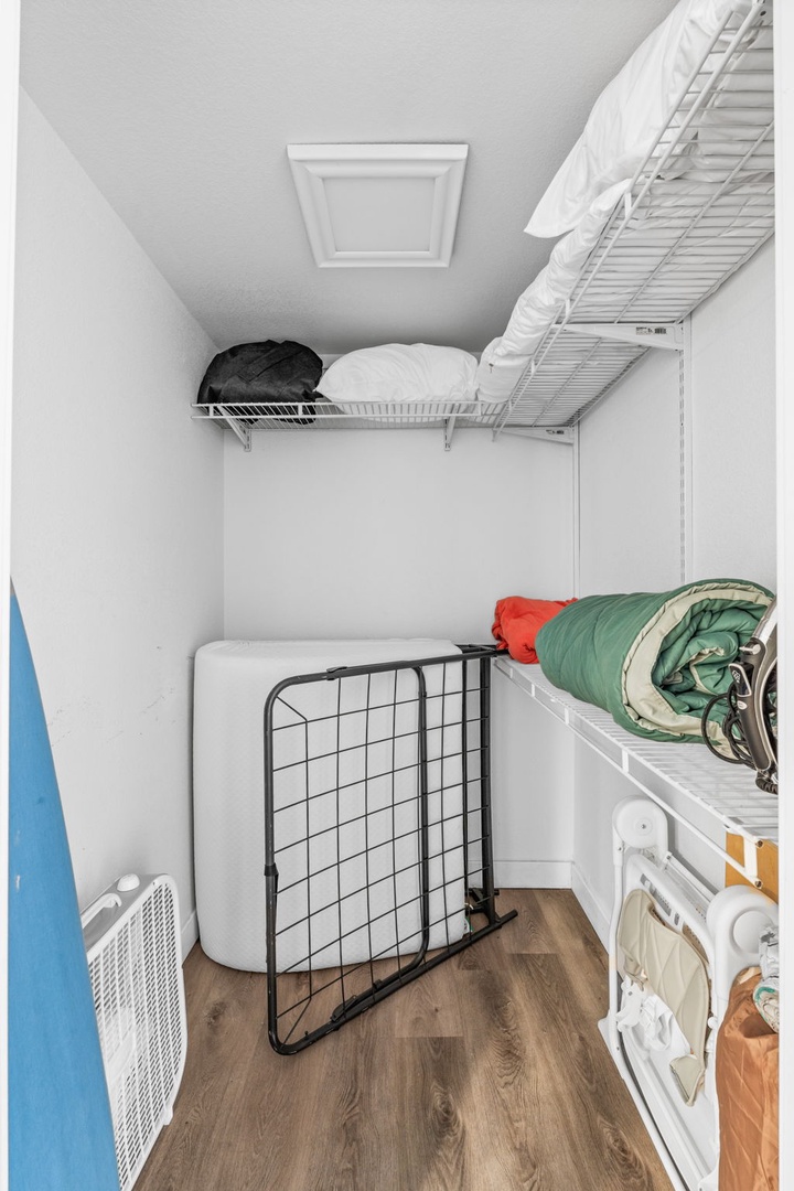 Keep your belongings fresh and organized in this convenient laundry space, complete with washer, dryer, and ample storage.