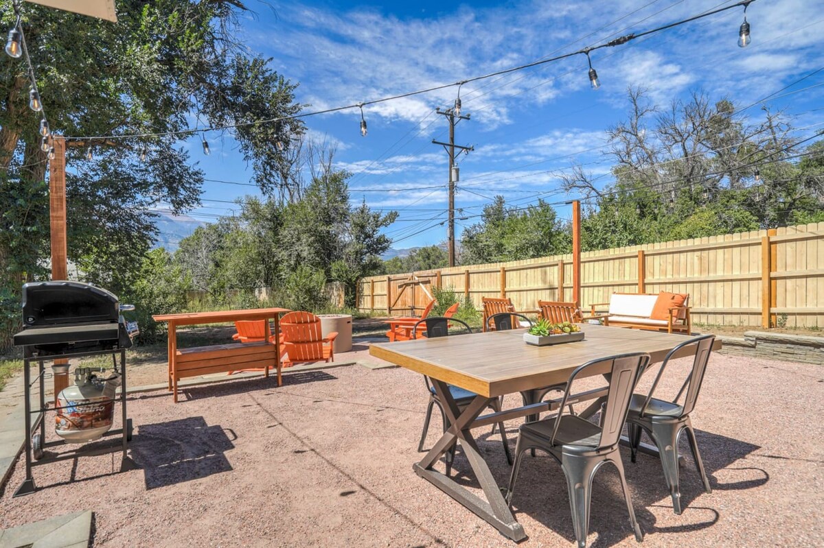 Step into your private outdoor haven with stylish dining table, cozy seating, and BBQ grill ready for memorable evenings under twinkling lights.