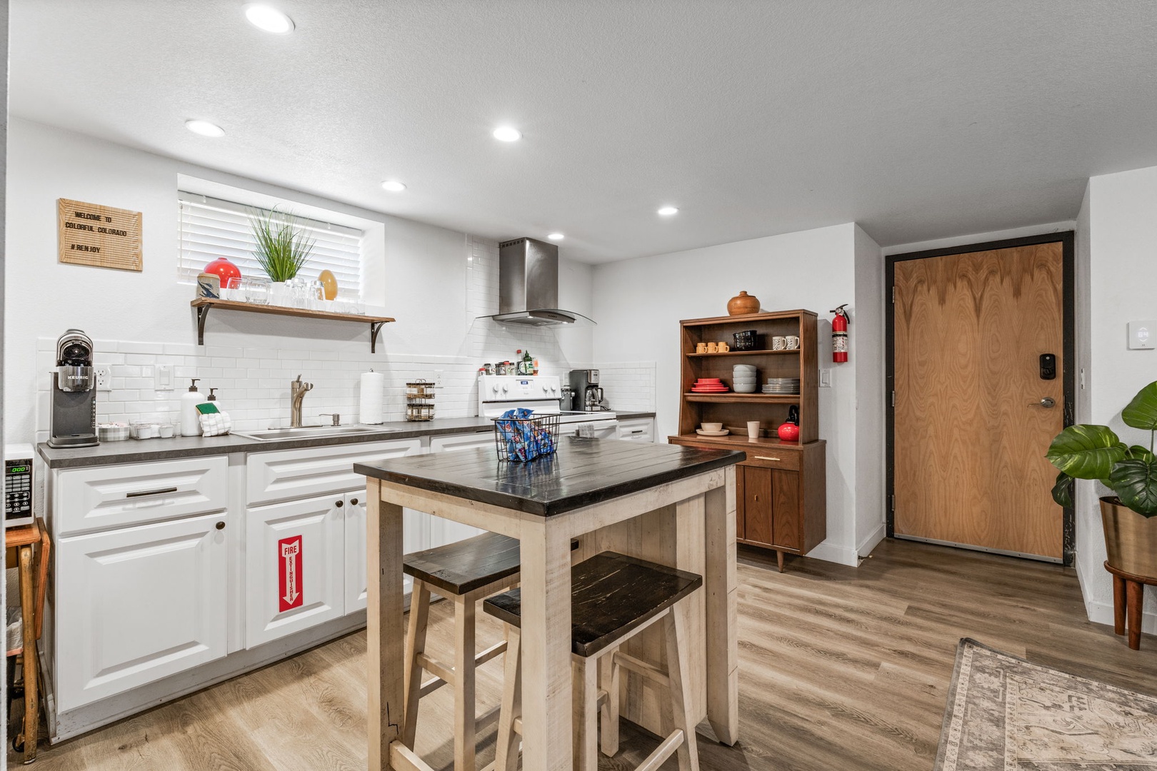 Whip up your favorite meals in this beautifully appointed kitchen, featuring modern appliances and a convenient island for casual dining.