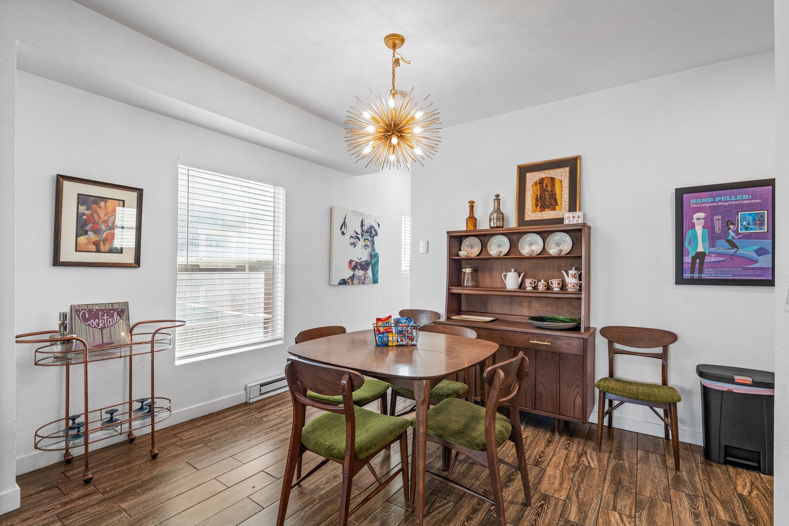 Gather around this stylish dining table where warm wood tones and vintage charm create the perfect setting for your memorable meals together.