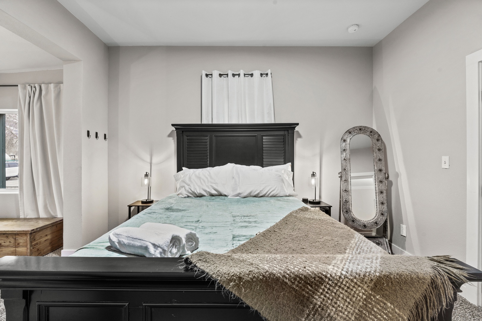 Sink into plush bedding and enjoy the thoughtful touches like fresh towels and cozy throws in your peaceful bedroom retreat.