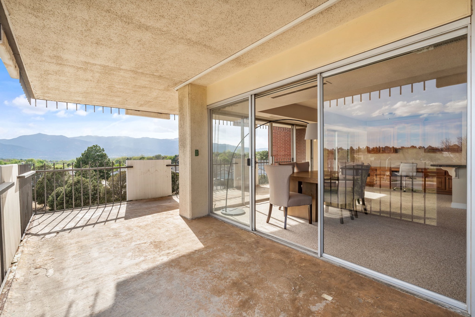 Step out onto your private balcony and take in sweeping mountain views stretching across the horizon. The covered terrace offers shade while you sip morning coffee or unwind at day's end.