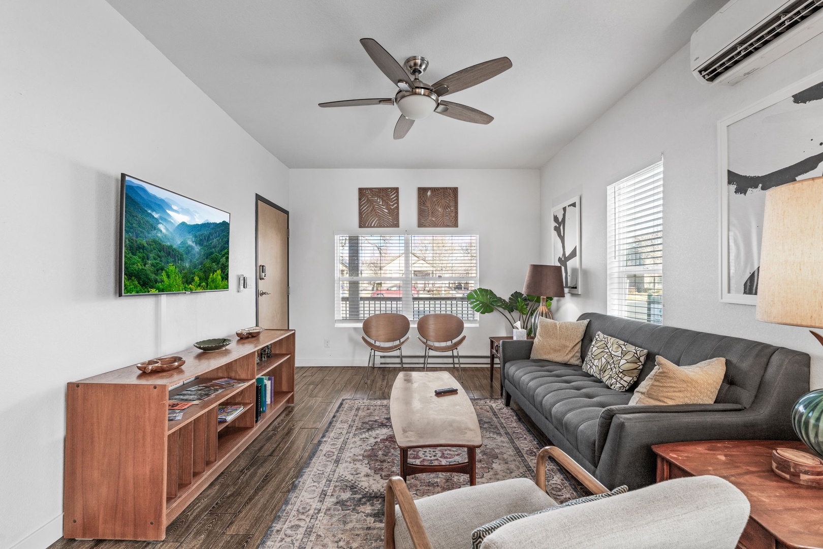 Relax in your stylish living space with modern comfort. Sink into the plush sofa and enjoy entertainment on the large TV.